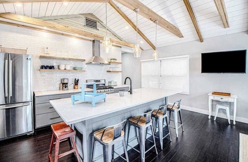 Lakeside House | Fully-renovated lakefront home with beach cabana, association beach, & firepit