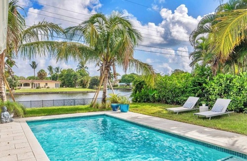 Lake Clarke Shores House | Fully upgraded waterfront pool home, centrally located in West Palm Beach!