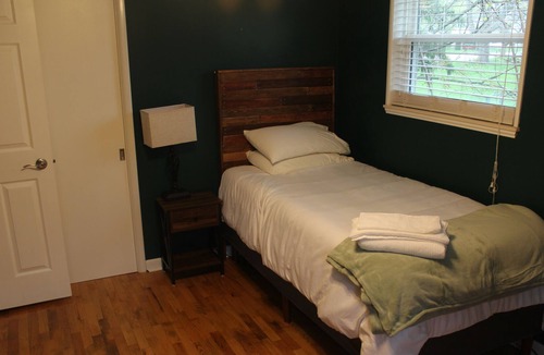 Lansing House | Gamer's retreat! 4-bedroom home full of fun