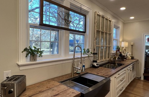 Aiken House | Gated property with historic main home + charming cottage.