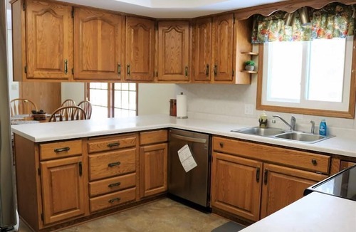 Escanaba House | Greenwood Getaway: Your Summer Escape to Lake Michigan Adventures