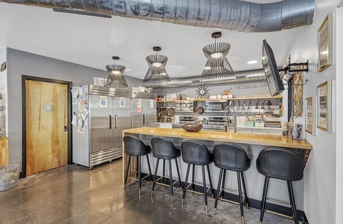 Pacific Hotel | Group suite with full kitchen and laundry on the second floor of The Landing Hub Hotel