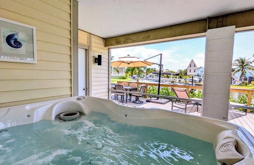 Estero Bay Shores House | Gulf Access Canal 3 BR Home: Bring your Boat, Kayaks, Game Room, Gym, Hot Tub