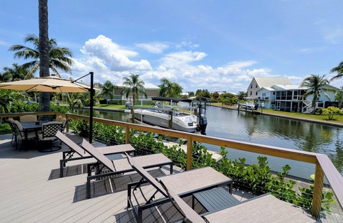 Estero Bay Shores House | Gulf Access Canal 3 BR Home: Bring your Boat, Kayaks, Game Room, Gym, Hot Tub