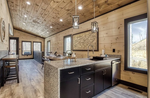 Gatlinburg - Pigeon Forge Ski Chalet | Header: Whiskey Splash | Indoor Pool · Hot Tub · 75-Ft Waterfall · Sleeps 10