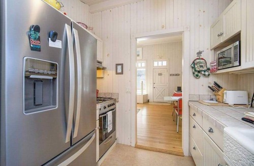 Walloon Lake House | Historic cozy cottage in Walloon Lake village close to Boyne Mountain skiing!