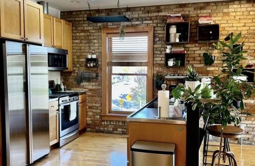 Lansing Apartment | Historic Lofts w/Rooftop Deck, River View, Sleep 8