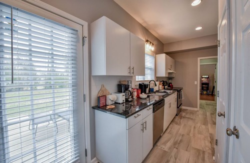 Tuscaloosa House | Honeysuckle Hideaway - Game Room, Outdoor Fireplace, and more!