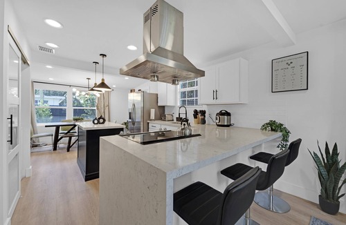 Westgate House | House with Fenced Yard - Palm Wave Says -