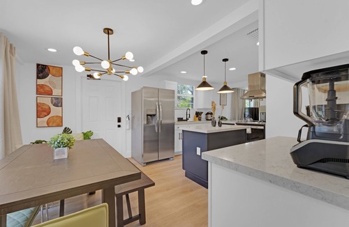 Westgate House | House with Fenced Yard - Palm Wave Says -