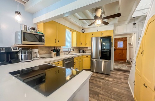 North Glade Hills House | Iconic Lakefront Cottage with Hot Tub and Dock! Pet friendly