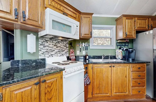 Gerton House | Idyllic Creekside Getaway with Private Waterfall | Near Asheville & Lake Lure