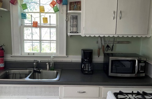 Edgewood Cottage | intown escape small cottage on half acre garden walk to edgewood shopping