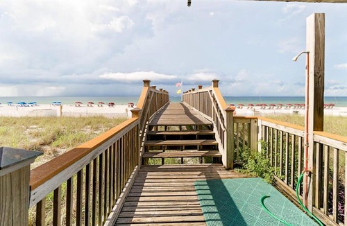 Ono Island Apartment | Inviting Gulf-front condo In Perdido Key with waterfront pool hot tub and oceanfront balcony