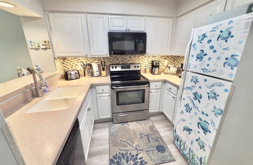 Arcadian Shores Condo | Kingston Laurel 210 2nd floor Elevator,Pool,Beach