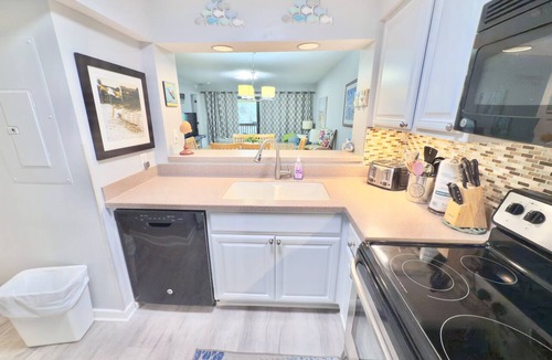 Arcadian Shores Condo | Kingston Laurel 210 2nd floor Elevator,Pool,Beach