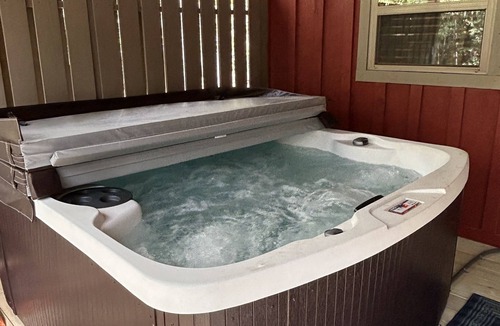 Jasper Cabin | Knotty Pine cabin, Couples Retreat w/Hot Tub And Patio Gas log Fireplace.