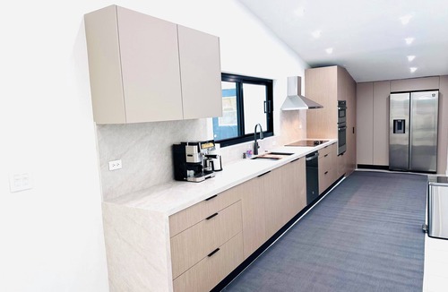Ojus House | Kosher-Friendly Waterfront house with a pool. 80ft canal.