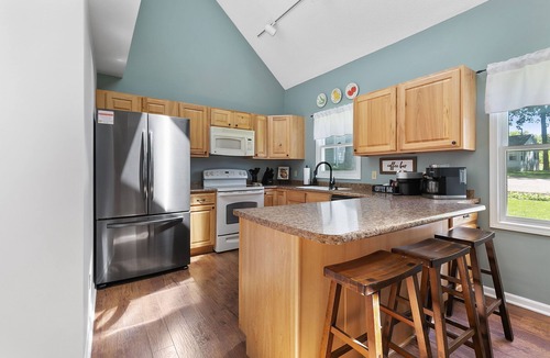 Paw Paw Lake House | Lake Front, Hot Tub, Game Room, Kayak/SUPs, Firepit, Pet Friendly