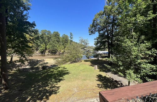 Mount Ida House | Lake side three bedroom, two bath house on Lake Ouachita with private hot tub. by RedAwning
