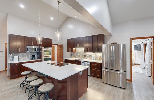 Leesville House | Lakefront home in the woods with dock, den, & private hot tub - dog-friendly