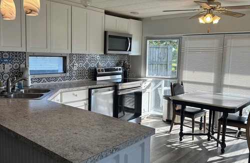 Copeland House | Lakefront home with private swim dock on Grand Lake Pet friendly & fenced yard.