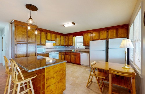 Prosperity House | Lakefront home with incredible sunset view, private dock, screened porch, and AC