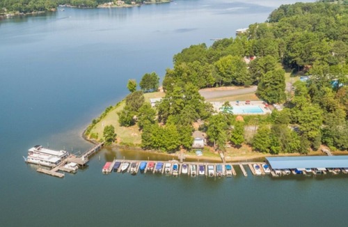 Steele Creek Cabin | Lakefront Property Two Bedroom Cabin #36 at Long Cove Resort by RedAwning