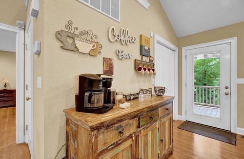 Cadiz House | Lakefront Retreat with private dock, game room, bar, and sunroom views