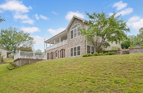 Cadiz House | Lakefront Retreat with private dock, game room, bar, and sunroom views