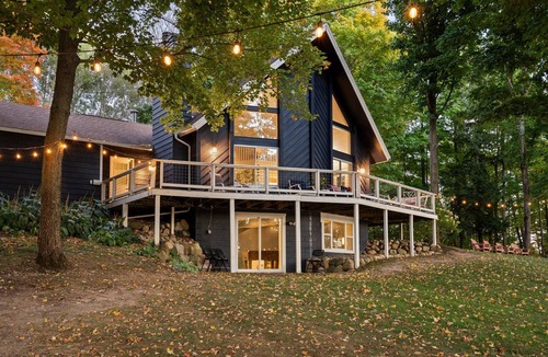 Gaylord Cottage | Lakefront Spacious Cottage with Sandy Beach, Kayaks and Games!