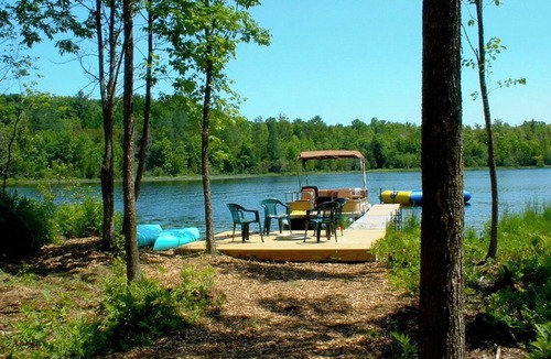 Traverse City House | Lakefront with Pontoon Boat, Game Room, Kayaks — No Host or Cleaning Fees