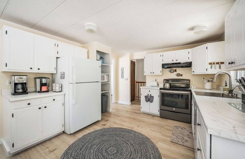 East Jordan House | Lakeside Bliss: Your Ultimate Four-Season Retreat