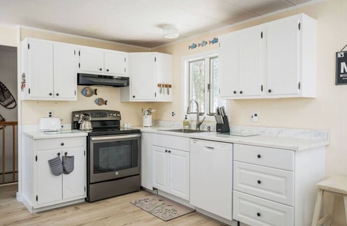 East Jordan House | Lakeside Bliss: Your Ultimate Four-Season Retreat