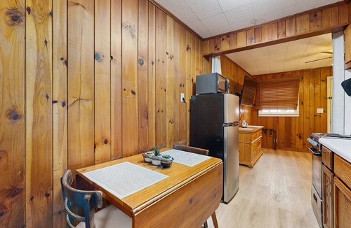 Flat Rock Condo | Lakeside condo, dog-friendly, AC, large porch, shared amenities, beach access, pool, tennis