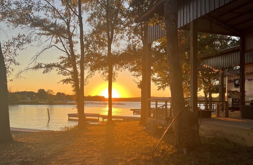 Lincoln House | Lakeside Luxury: Covered RV Site with Upgraded Patio and Private Pier
