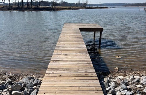 Lincoln House | Lakeside Luxury: Covered RV Site with Upgraded Patio and Private Pier