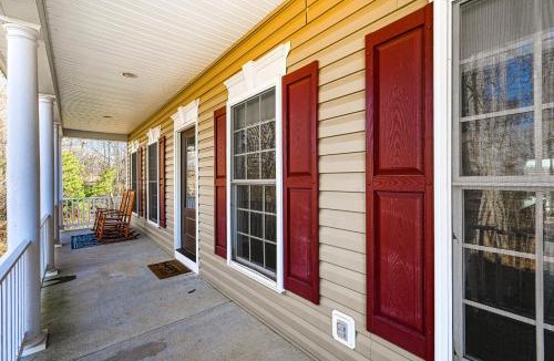 Orange House | Lakeside retreat with a firepit, dock, deck, hot tub, pool table - dog friendly