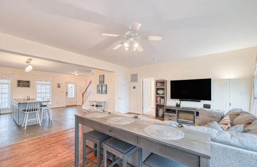 Orange House | Lakeside retreat with a firepit, dock, deck, hot tub, pool table - dog friendly