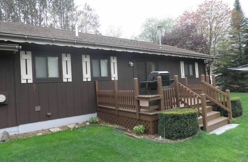 Cadillac House | Lazy Acorn "The Yellow Perch" on Lake Mitchell