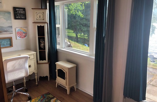 Long Lake Cottage | Little Long Lake lakefront cottage with its own beach and private drive.