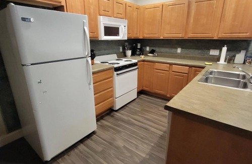 Ludington House | Ludington STRAM - Unit 202, a cozy 2-bedroom retreat