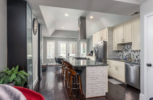 Near Northeast House | Luxe Three floors. Four bedrooms each with private full bath Garage Parking