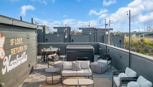 Katie Hill Neighborhood Apartment | Luxe Urban Retreat - Private Rooftop Hot Tub Deck