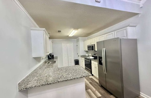Southwind House | Luxury 6 BR Home near Memphis Airport with Upscale Amenities.