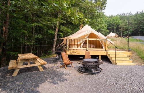 Great Cacapon RV Rental | Luxury Camping with King Bed - Greenbrier Tent