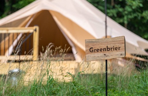 Great Cacapon RV Rental | Luxury Camping with King Bed - Greenbrier Tent