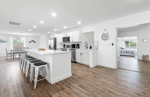 West Palm Beach House | Luxury Coastal Oasis with Heated Pool and 4BR Family Retreat Near Beaches
