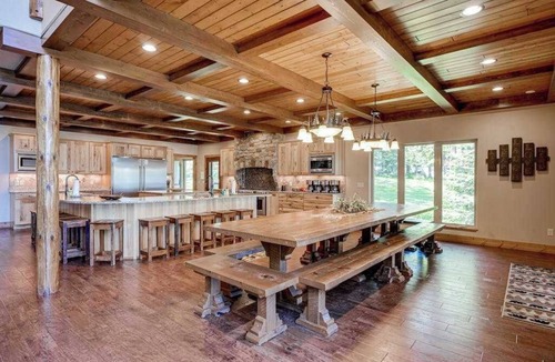 Eagle River House | Luxury lakefront home with high-speed WiFi, dock, private beach, & theater room