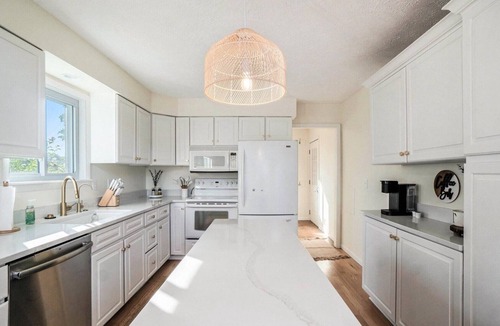 Gaylord House | Marvelous 4-bedroom lake house in Gaylord with sunset views & private beach